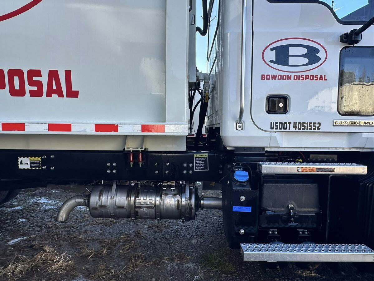 Bowdon Disposal truck detail with logo